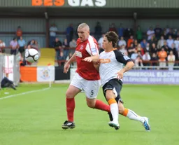 Unusually Danny Crow beaten for size in a battle with future Luton Legend Steve McNulty