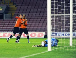 Danny Crow and Howells celebrate Jake's goal