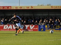 Danny Crow slots another penalty for the Town's fourth