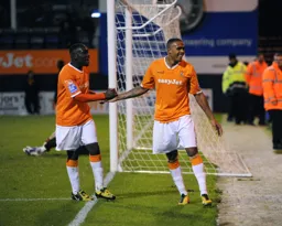 All smiles as Godfrey Poku and Matthew Barnes-Homer celebrate the latters goal