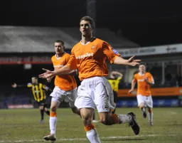Luke Graham celebrates his first and last goal of his loan spell on his full debut