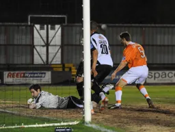 Luke Graham applies the pressure but the keeper holds on