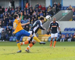 Danny Crow stoops to conquer but to no avail as the Town go down 1-0