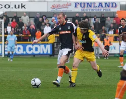 Keith Keane wins this battle against a soon to be Hatter John-Paul Kissock