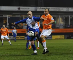 Paul Carden battling away in midfield