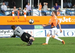 Robbie Willmott lifts the ball over the keeper to make it two