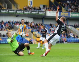 Jake Howells goes close for the Hatters but the game ends scoreless at Field Mill yet another draw for the Town