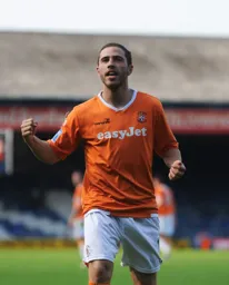 Willmott celebrates his second and the Hatters third goal