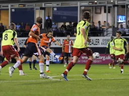 Robbie Willmott lets fly from outside the penalty area