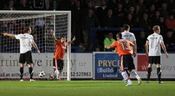 Danny Crow and Stuart Fleetwood celebrate after Amari Morgan-Smith has scored the first goal
