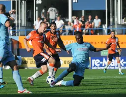 Adam Watkins is about to score Town`s third goal