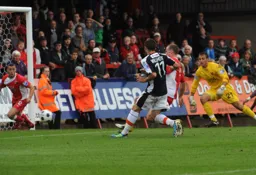 Robbie Willmott taps the ball into the net for his and Town`s first goal