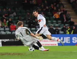 Alex Lawless sees his shot saved by Danny Potter