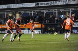 Alex Lawless tries his luck from long range