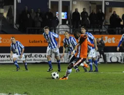 Aaron O`Connor scores the only goal of the game from the penalty spot