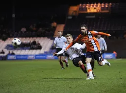 Robbie Willmott chases after the ball