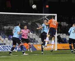 Janos Kovacs gets above Ross Dyer but cannot find the target