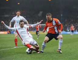 Adam Watkins looks for a way through