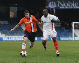 Craig McAllister gets past Francino Francis