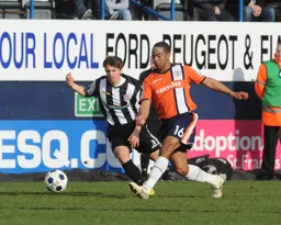 Ed Asafu-Adjaye strides forward with the ball