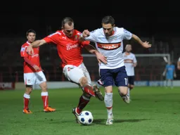 Robbie Willmott tussles for the ball