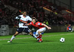 Andre Boucaud is held off the ball
