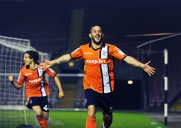 Stuart Fleetwood showss his delight after scoring Town`s last minute equaliser