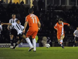 Alex Lawless with an unsuccessful shot at goal