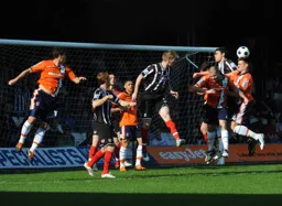 Keith Keane and Janos Kovacs put the Grimsby defence under pressure