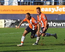 Andre Gray is off to celebrate his goal along with 1132 Janos Kovacs