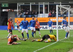 Keith Keane tumbles over after scoring the third goal