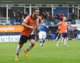Stuart Fleetwood wheels away after scoring his and Town`s second goal