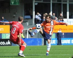 Alex Lawless controls the ball
