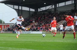 Stuart Fleetwood takes a shot at goal