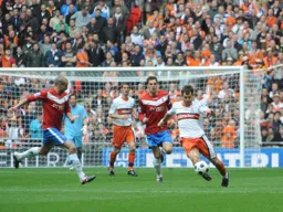 Alex Lawless looks to start an attacking move