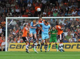 Janos Kovacs wins a defensive header