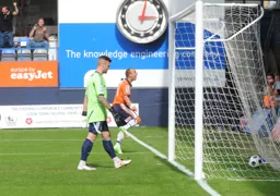 With a minute on the clock Jake Howells puts the Town in front