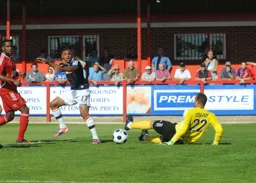 Andre Gray`s shot beats Jon Stewart but is off target