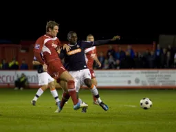 Lathaniel Rowe-Turner attempts to cut out a pass