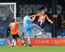 Dean Beckwith clears the danger