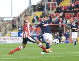 Alex Lawless goes for goal