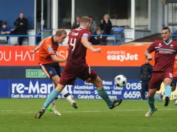 Scott Rendell fires a shot at goal