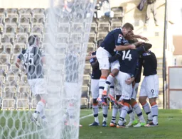 Celebrations following Scott Rendell`s last minute winner from the penalty spot