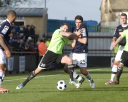 Ronnie Henry is blocked off the ball by James Norwood