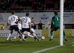 Stuart Fleetwood tries to find a way through against his former club