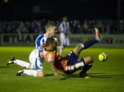 Andre Gray takes a tumble