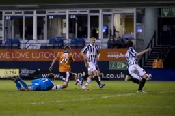 Dan Walker scores his second and Town`s third goal