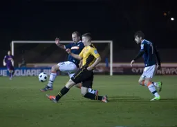 Jake Howells battles for possession