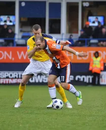 Jake Howells holds off his marker