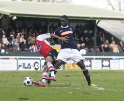 Arnaud Mendy battles for possession